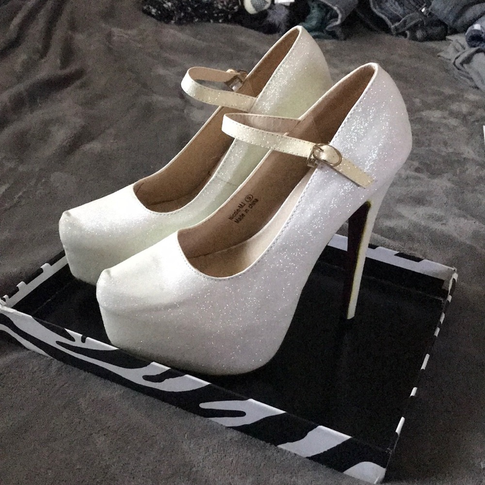 Amiclubwear white heels.